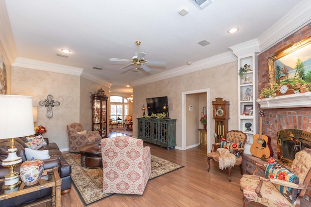 7821 Covington Pkwy, Amarillo, TX 79121 - living area with wood finished floors, ceiling fan, a brick fireplace, recessed lighting, and baseboards