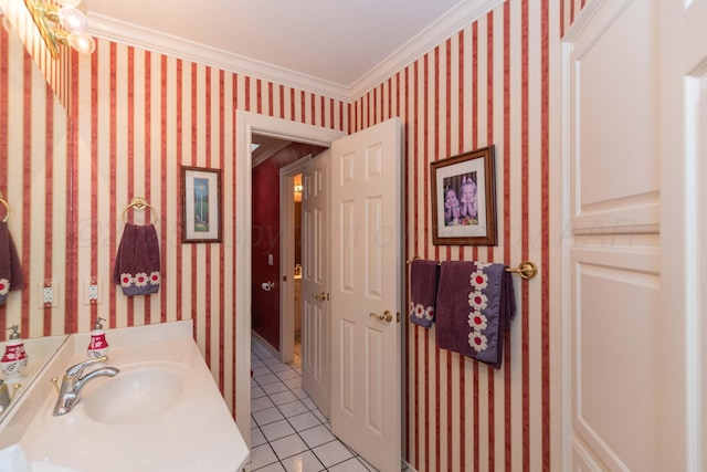 7821 Covington Pkwy, Amarillo, TX 79121 - bathroom featuring tile patterned flooring, ornamental molding, vanity, and wallpapered walls