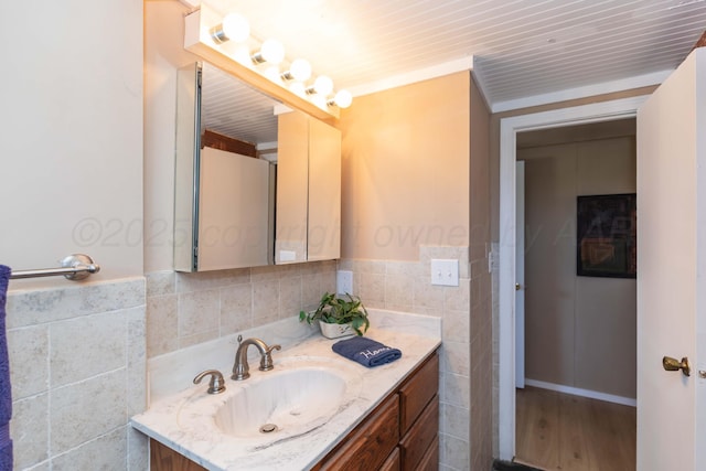 233 Doucette Dr, Howardwick, TX 79226 - bathroom with vanity and tile walls