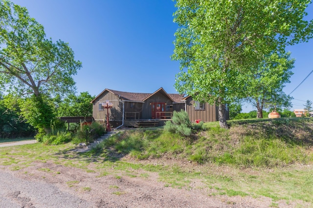 233 Doucette Dr, Howardwick, TX 79226 - view of home's exterior featuring board and batten siding and a deck