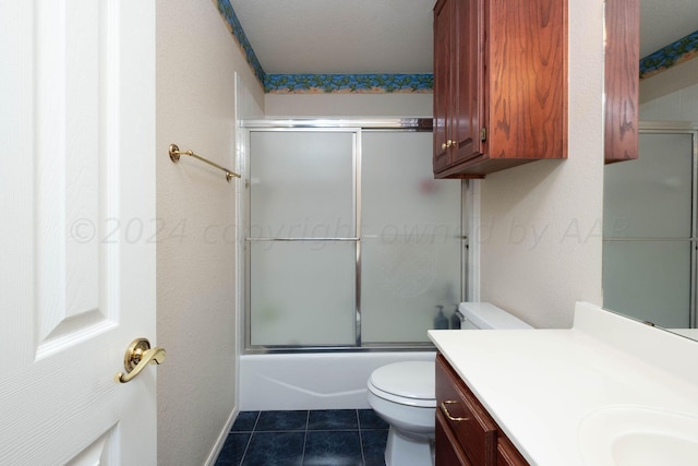 4502 Chesapeake Pl, Amarillo, TX 79119 - full bath featuring toilet, vanity, shower / bath combination with glass door, and tile patterned flooring