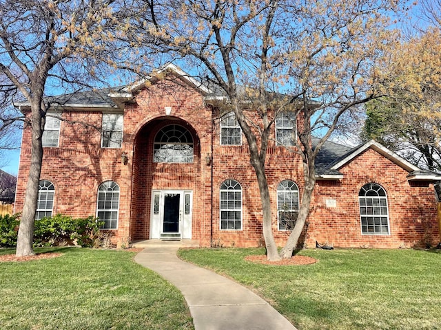 4502 Chesapeake Pl, Amarillo, TX 79119 - traditional-style home with a front yard and brick siding
