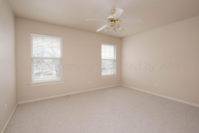 4502 Chesapeake Pl, Amarillo, TX 79119 - spare room featuring carpet flooring, baseboards, and ceiling fan