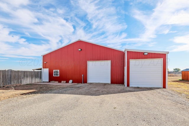 garage featuring fence