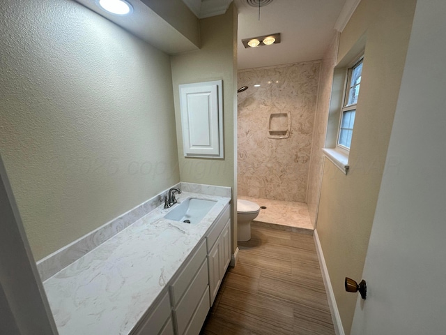 107 Galahad St, Borger, TX 79007 - bathroom featuring toilet, a shower stall, vanity, and baseboards