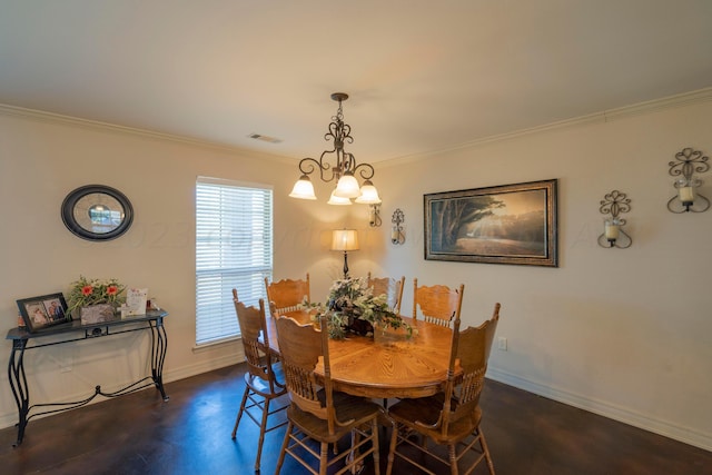 dining room with visible vents, baseboards, concrete flooring, and crown molding