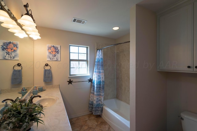 bathroom featuring tile patterned flooring, visible vents, toilet, shower / tub combo with curtain, and vanity