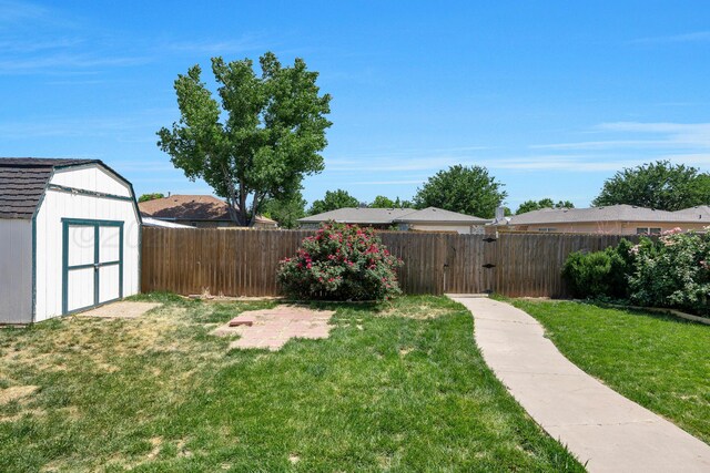 6814 Blacksmith Ln, Amarillo, TX 79109 - fenced backyard featuring a storage shed