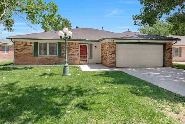6814 Blacksmith Ln, Amarillo, TX 79109 - ranch-style house with brick siding, an attached garage, concrete driveway, and a front lawn