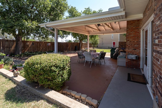 view of patio / terrace featuring ceiling fan