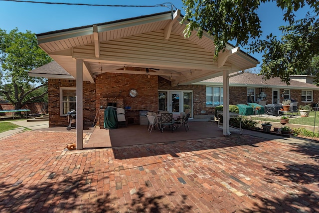 view of patio featuring a grill