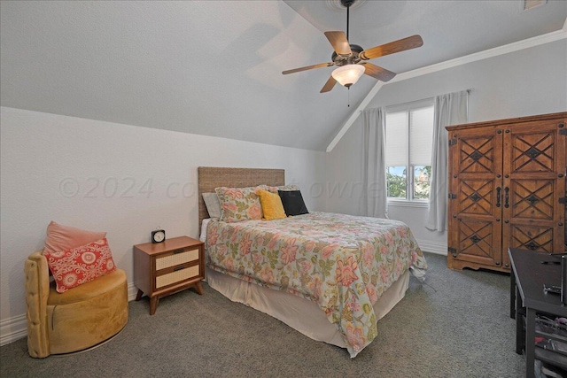 carpeted bedroom with ceiling fan, lofted ceiling, and ornamental molding