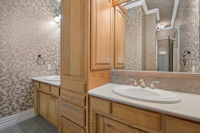 bathroom featuring vanity, tile patterned floors, crown molding, and backsplash