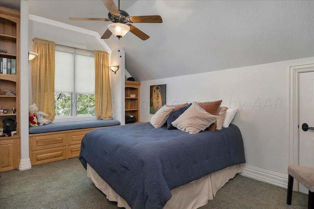 carpeted bedroom featuring a textured ceiling, ceiling fan, and vaulted ceiling