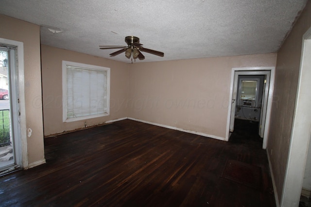 1720 S Highland St, Amarillo, TX 79103 - unfurnished bedroom with wood finished floors, a textured ceiling, ceiling fan, and access to outside