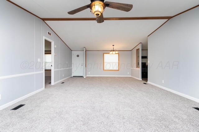 unfurnished room featuring carpet flooring, ceiling fan with notable chandelier, and ornamental molding