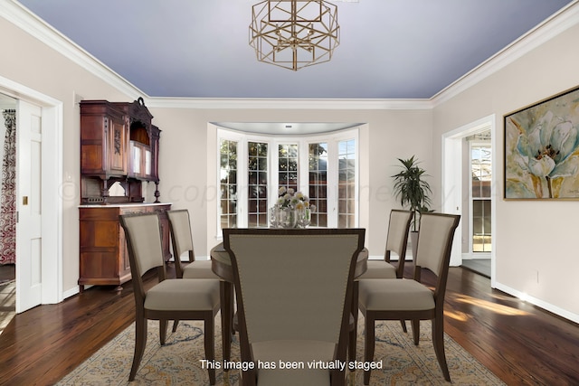 2802 S Hughes St, Amarillo, TX 79109 - dining room with dark wood finished floors, a chandelier, ornamental molding, and baseboards