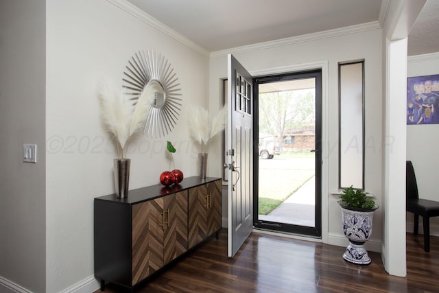 entryway featuring dark wood-style flooring, baseboards, and crown molding
