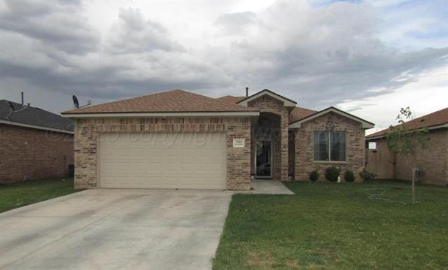 ranch-style house with a garage and a front lawn