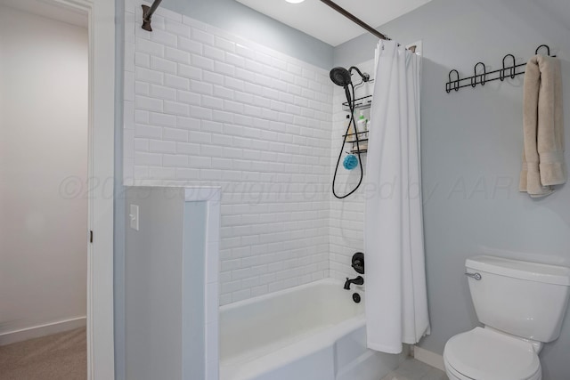 2215 S Hughes St, Amarillo, TX 79109 - bathroom with shower / tub combo and baseboards