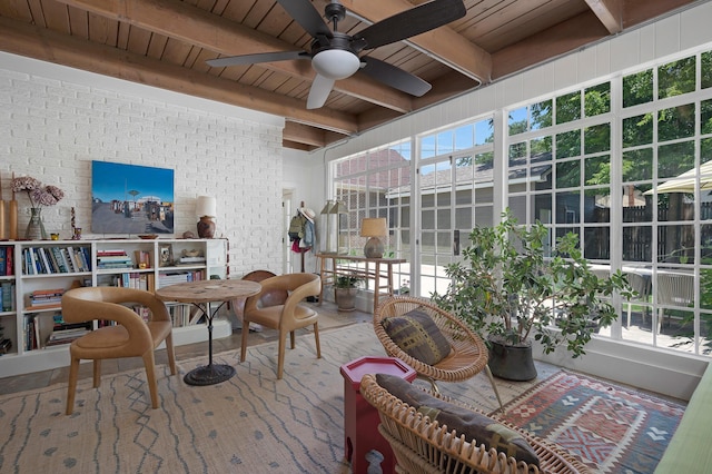 2215 S Hughes St, Amarillo, TX 79109 - sunroom featuring ceiling fan, beam ceiling, and plenty of natural light