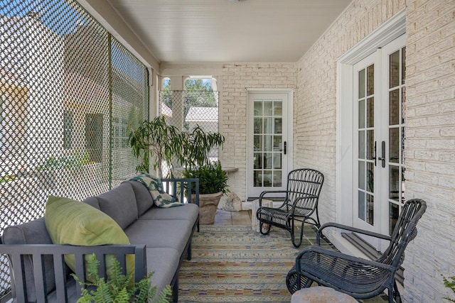 2215 S Hughes St, Amarillo, TX 79109 - sunroom / solarium with french doors and an outdoor hangout area