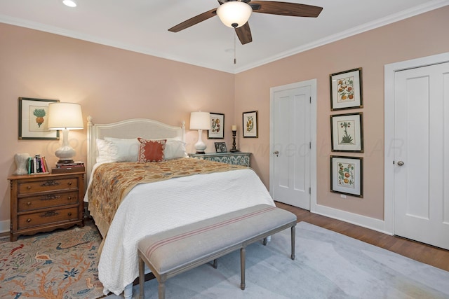 2215 S Hughes St, Amarillo, TX 79109 - bedroom featuring wood finished floors, ornamental molding, and a ceiling fan