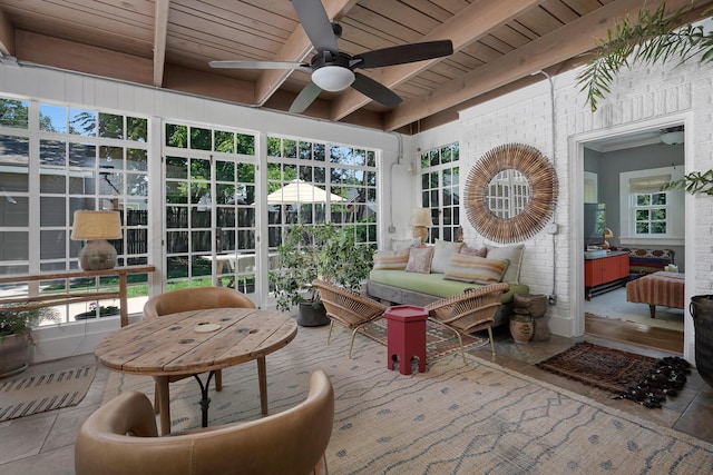 2215 S Hughes St, Amarillo, TX 79109 - sunroom with ceiling fan, beamed ceiling, and outdoor lounge area