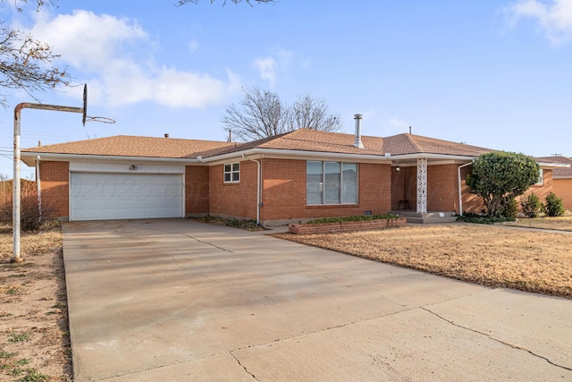 single story home featuring a garage