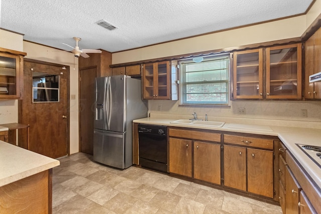 kitchen featuring ceiling fan, dishwasher, sink, stainless steel refrigerator with ice dispenser, and a textured ceiling