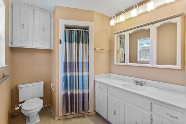 bathroom with tile patterned floors, a textured ceiling, toilet, vanity, and a shower with shower curtain