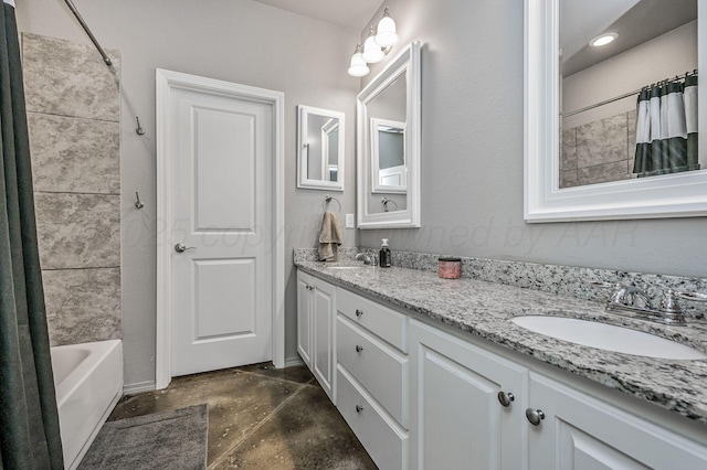 full bath featuring finished concrete floors, double vanity, and shower / bath combo with shower curtain