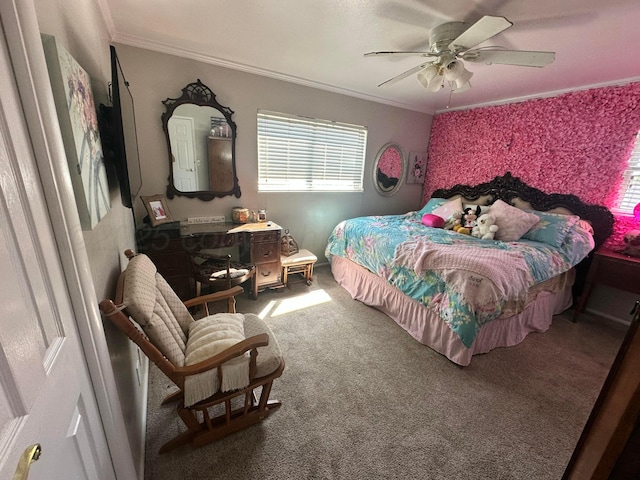 219 Inverness St, Borger, TX 79007 - carpeted bedroom featuring ornamental molding, multiple windows, and ceiling fan