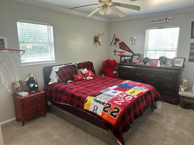 219 Inverness St, Borger, TX 79007 - bedroom featuring carpet floors, crown molding, multiple windows, and a ceiling fan