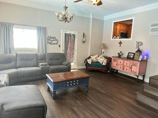 219 Inverness St, Borger, TX 79007 - living area featuring wood finished floors, a chandelier, crown molding, a textured ceiling, and stairs