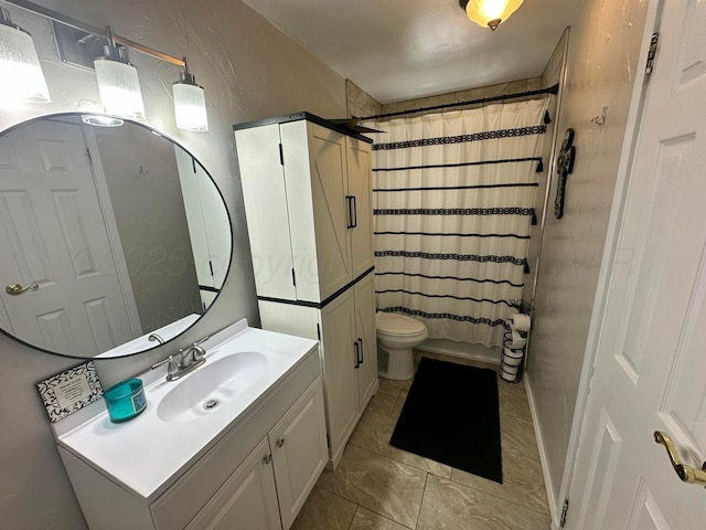 219 Inverness St, Borger, TX 79007 - bathroom with vanity, tile patterned flooring, toilet, and shower / tub combo with curtain