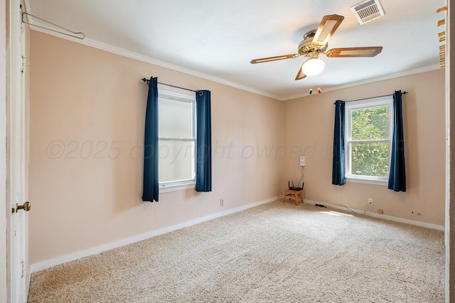 2804 Rule St, Amarillo, TX 79107 - carpeted empty room featuring ornamental molding, baseboards, and ceiling fan