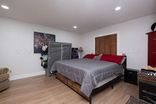 bedroom featuring light hardwood / wood-style floors