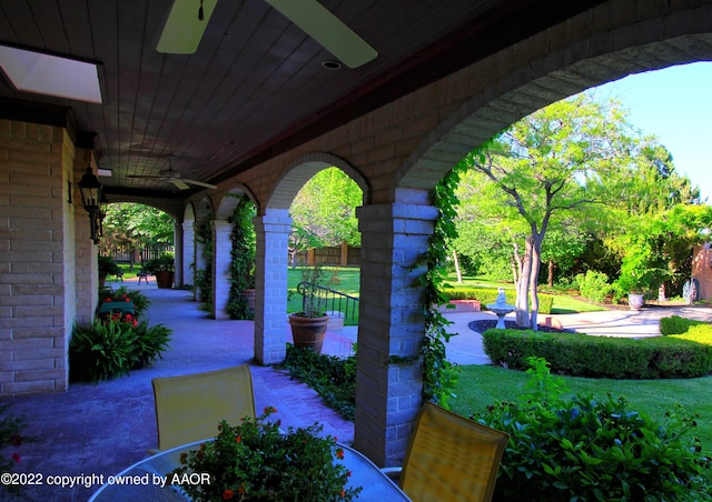 view of patio featuring ceiling fan