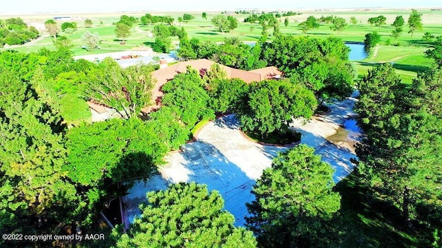 drone / aerial view featuring a water view and a rural view