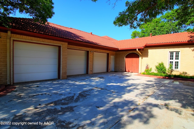 view of front of home with a garage