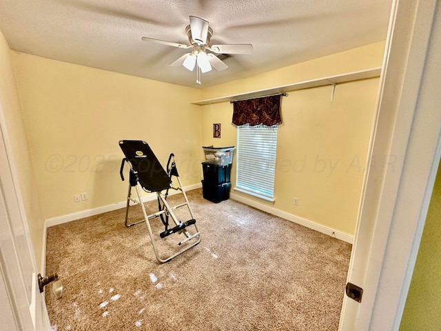 8422 Addison Dr, Amarillo, TX 79119 - exercise room featuring a ceiling fan, carpet, and a textured ceiling