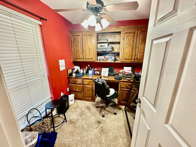 8422 Addison Dr, Amarillo, TX 79119 - carpeted office featuring built in desk and ceiling fan