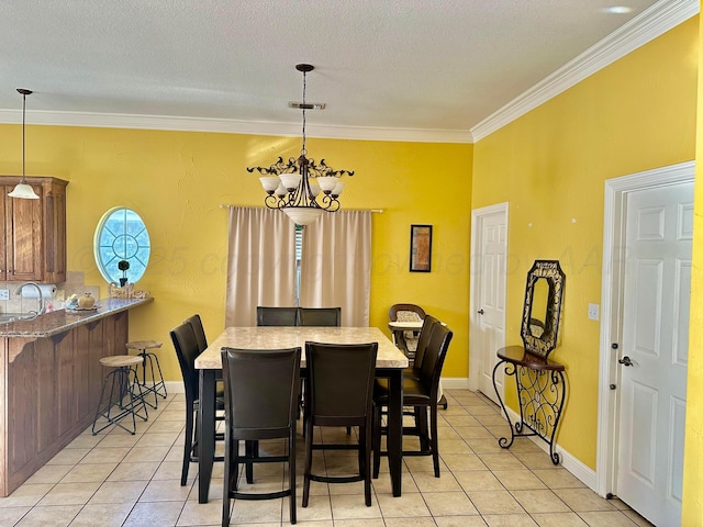 8422 Addison Dr, Amarillo, TX 79119 - dining space featuring light tile patterned flooring, a chandelier, crown molding, and a textured ceiling