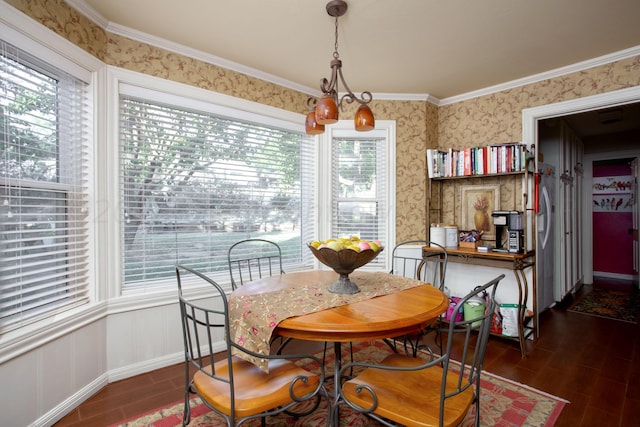 3 Nottingham Rd, Amarillo, TX 79124 - dining room with wood finished floors, plenty of natural light, wallpapered walls, and crown molding