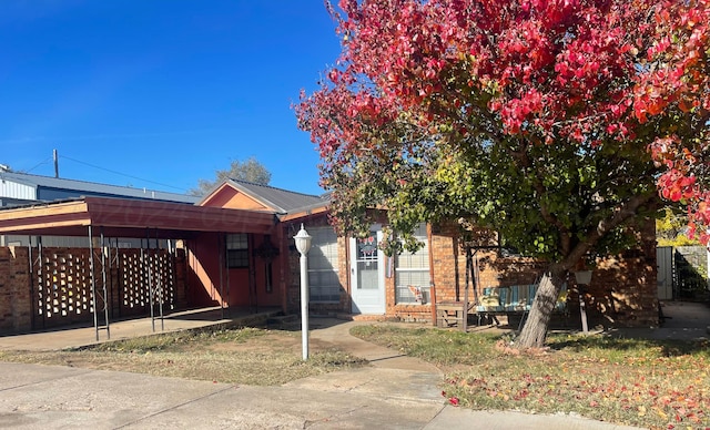 exterior space featuring a carport