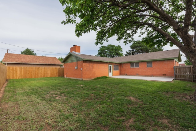 2709 Mohawk Dr, Amarillo, TX 79109 - rear view of house featuring a patio, brick siding, and crawl space