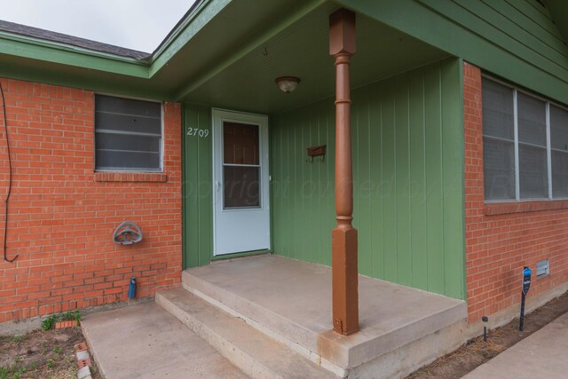 2709 Mohawk Dr, Amarillo, TX 79109 - view of exterior entry featuring brick siding