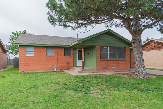 2709 Mohawk Dr, Amarillo, TX 79109 - single story home with brick siding and a shingled roof