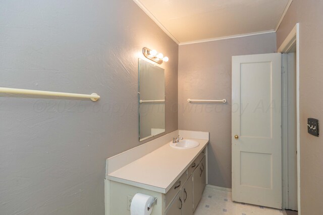 2709 Mohawk Dr, Amarillo, TX 79109 - bathroom featuring ornamental molding, vanity, and tile patterned floors